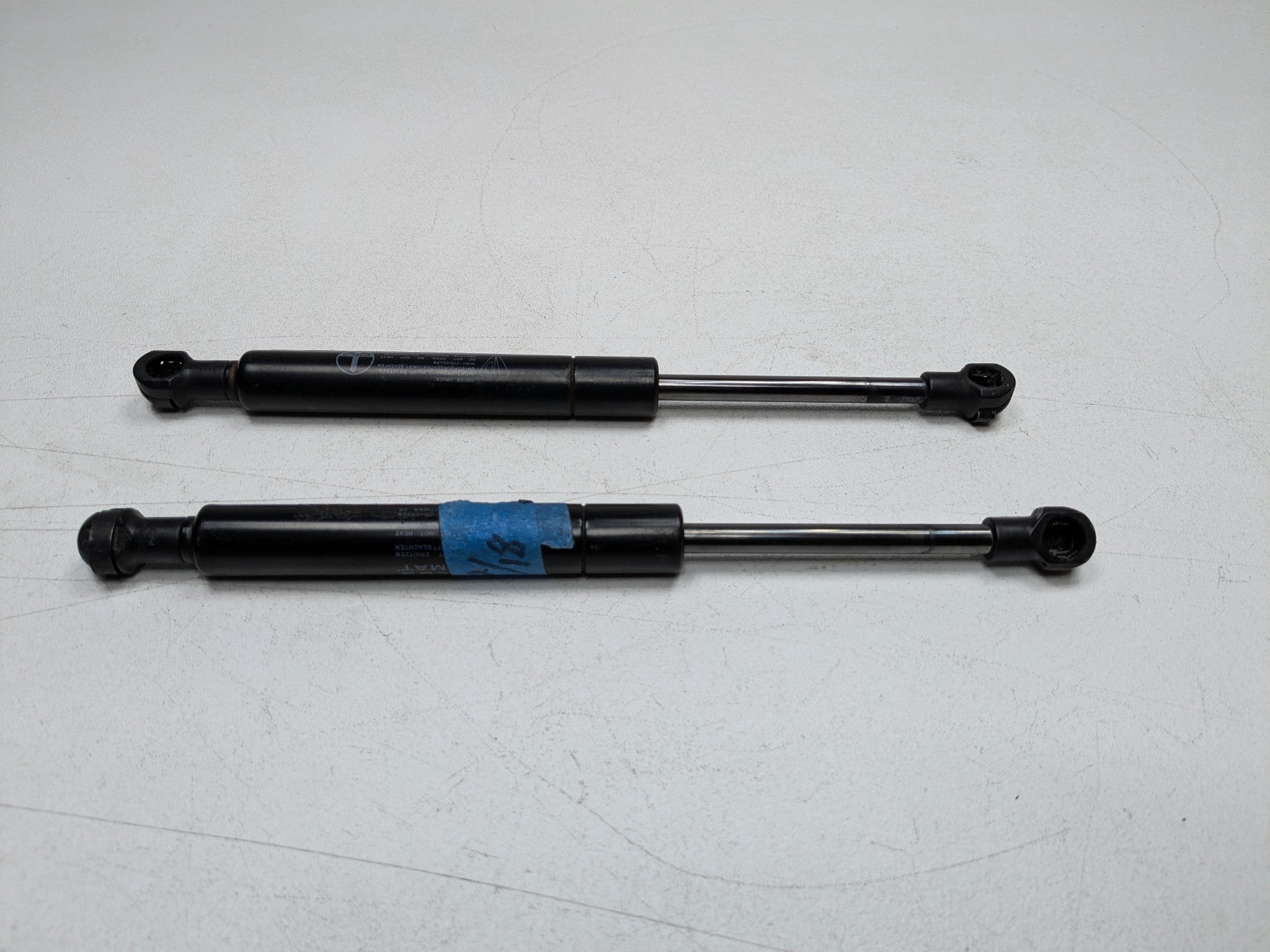 06 - 08 OEM PORSCHE CAYMAN FRONT LEFT AND RIGHT SIDE HOOD SUPPORT SHOCK STRUT