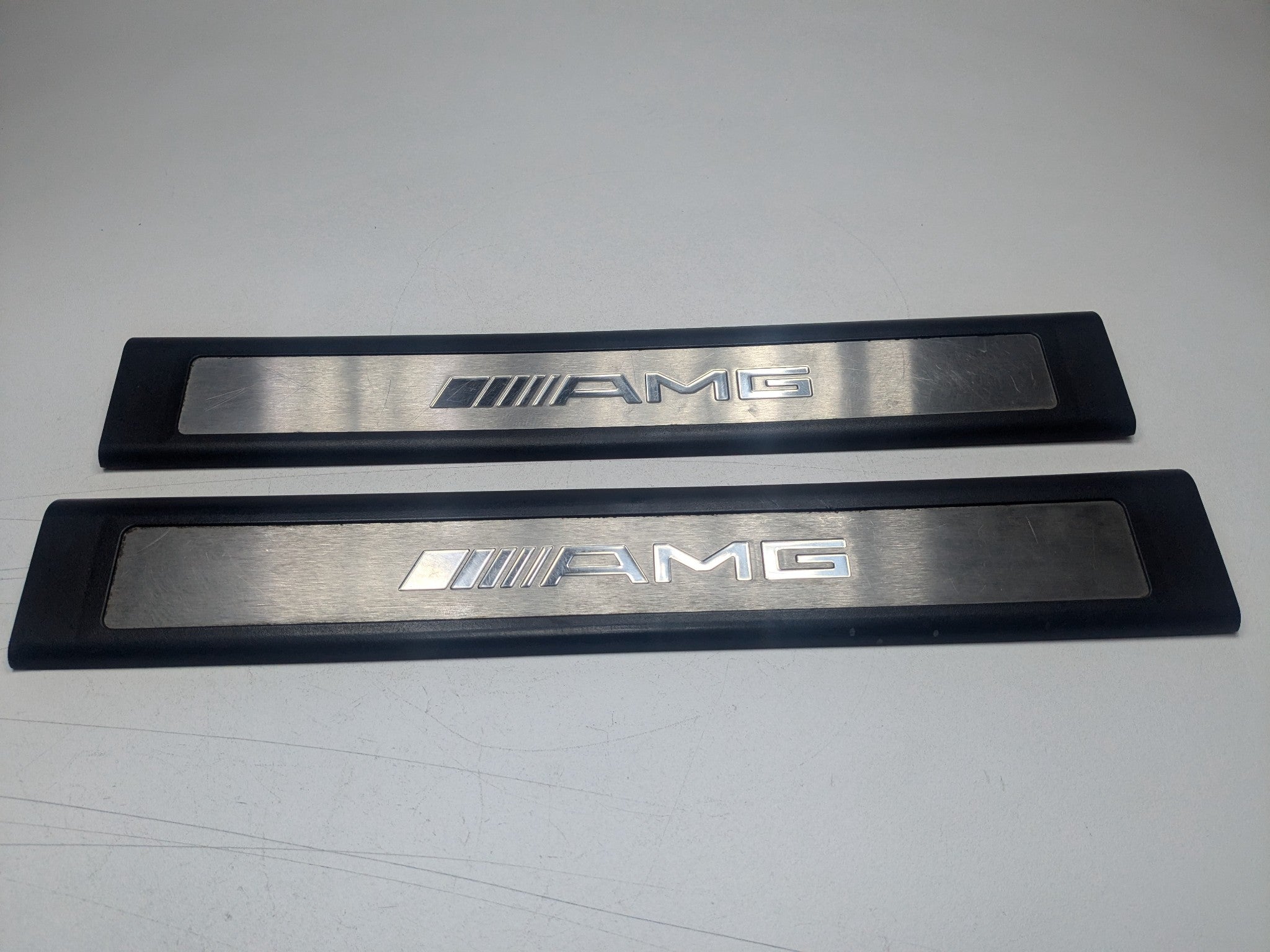 2009 - 2011 OEM MERCEDES-BENZ ML63 LEFT AND RIGHT DOOR SILL PLATE SET