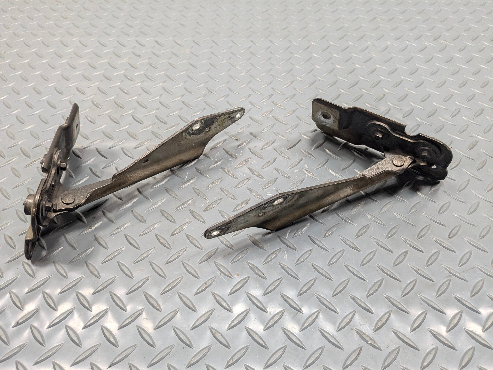 2009 - 2012 OEM FORD FLEX FRONT LEFT AND RIGHT SIDE HOOD HINGE SUPPORT SET