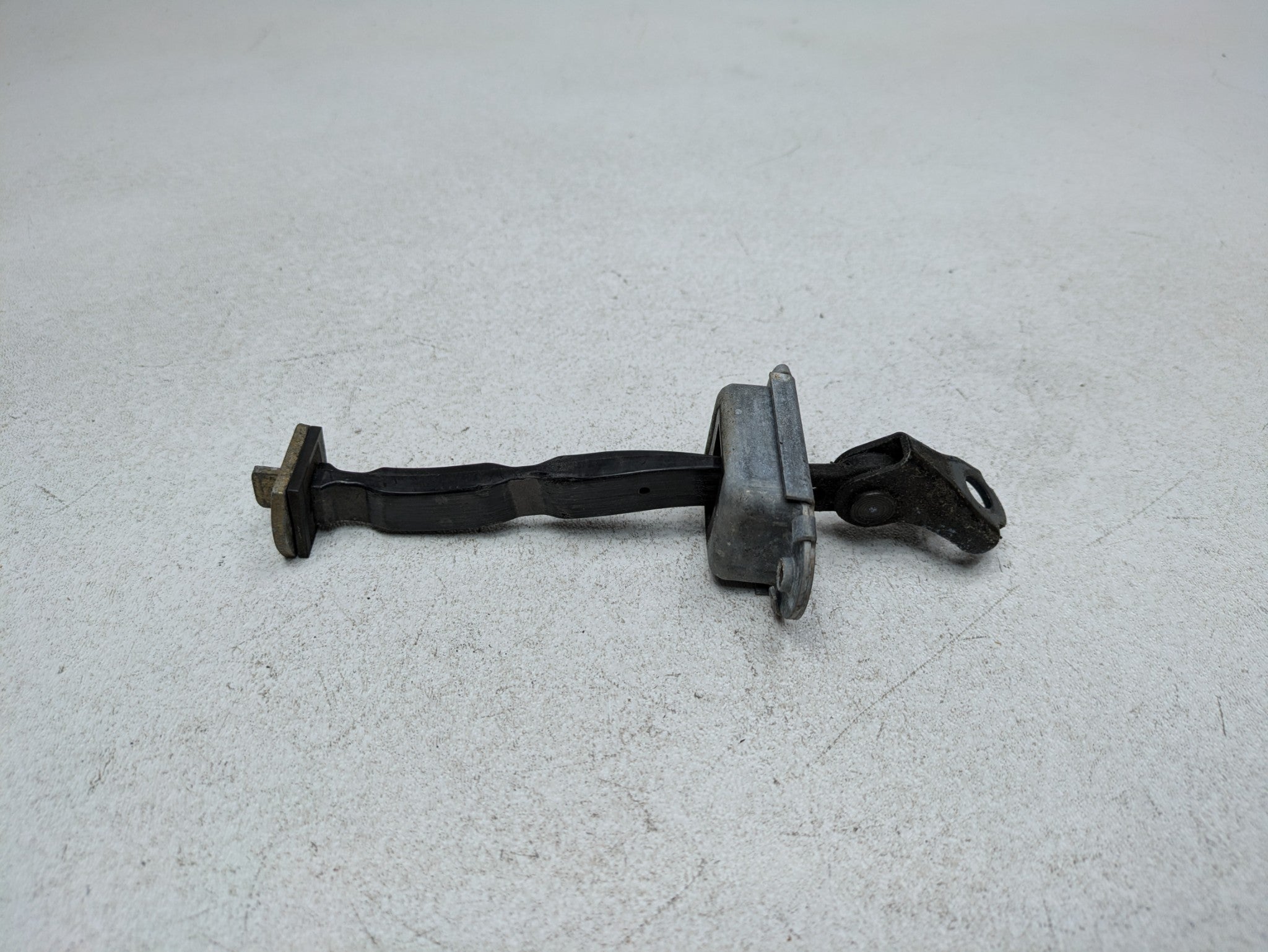 2004 - 2006 OEM NISSAN MAXIMA FRONT LEFT DRIVER SIDE DOOR CHECK STRAP STOPPER