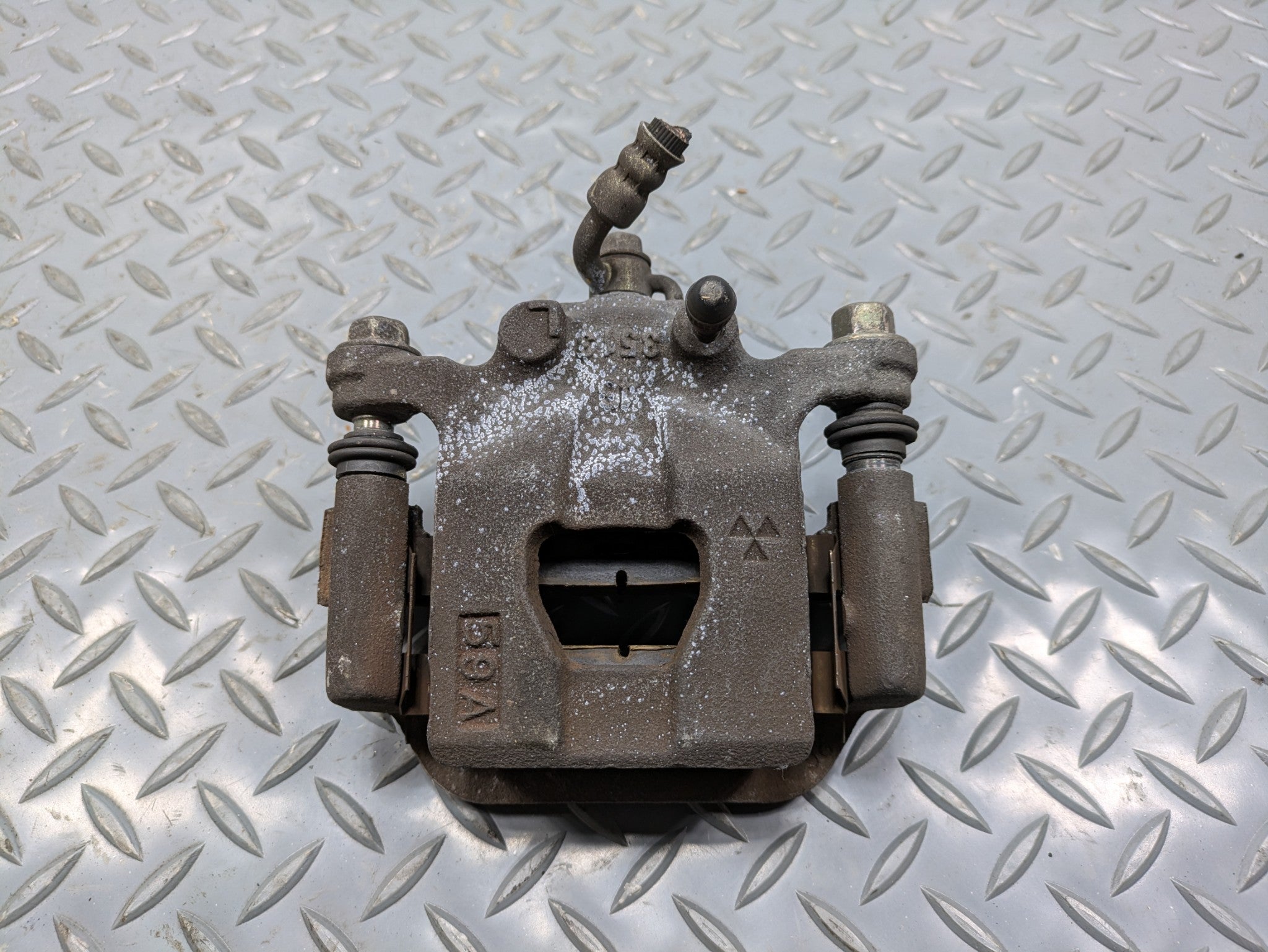 2004 - 2006 OEM NISSAN MAXIMA REAR LEFT DRIVER SIDE BRAKE CALIPER ASSEMBLY