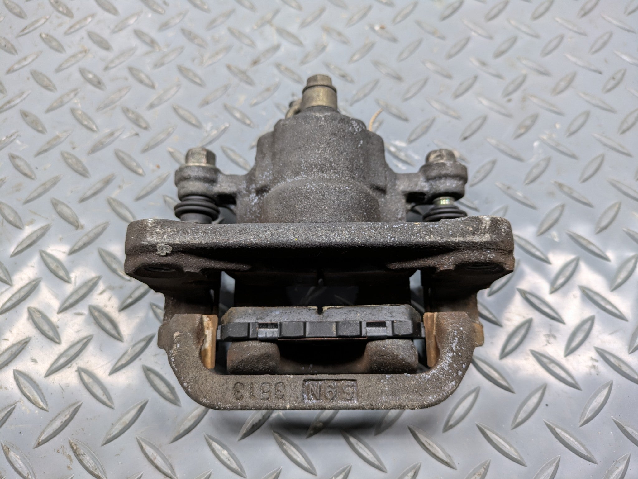 2004 - 2006 OEM NISSAN MAXIMA REAR LEFT DRIVER SIDE BRAKE CALIPER ASSEMBLY