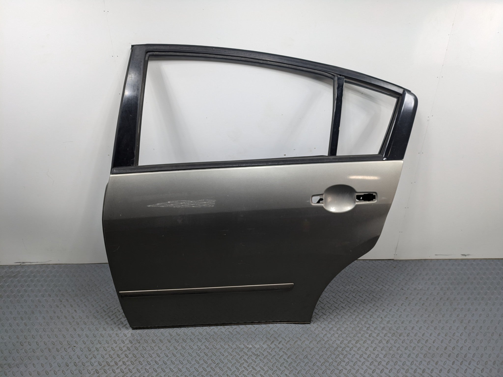 2004 - 2006 OEM NISSAN MAXIMA REAR LEFT DRIVER SIDE DOOR SHELL PANEL ASSEMBLY