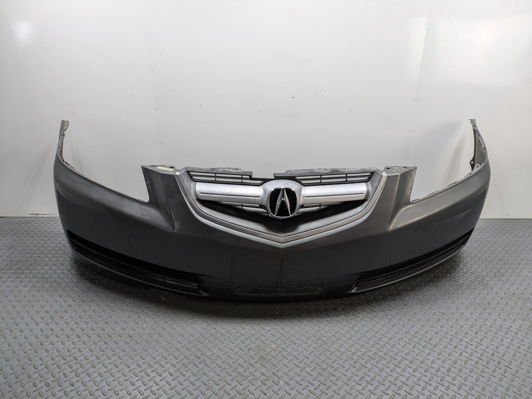 2004 - 2006 OEM ACURA TL FRONT BUMPER COVER PANEL WITH EMBLEM ASSEMBLY
