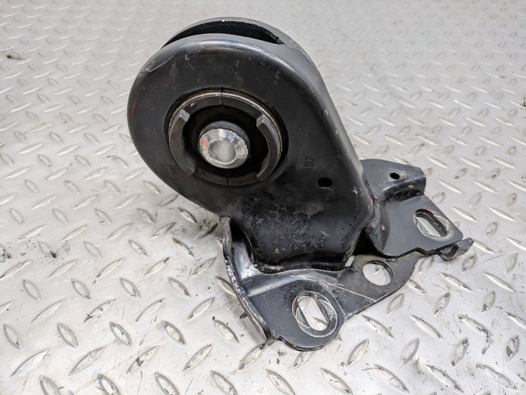 2010 - 2013 OEM MINI COOPER REAR RIGHT SIDE LOWER TRAILING ARM BRACKET BUSHING