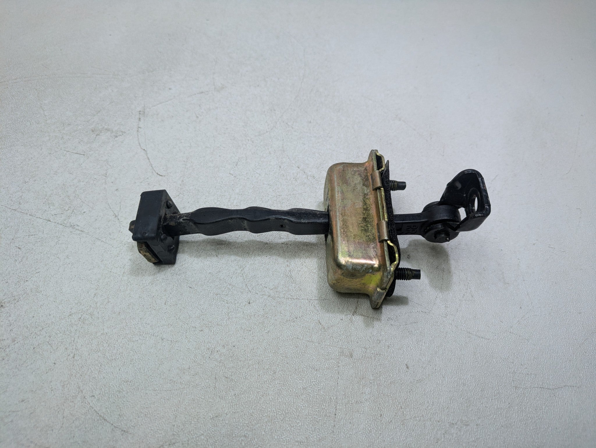 2000 - 2005 CADILLAC DEVILLE OEM DOOR CHECK STRAP STOPPER REAR LEFT DRIVER SIDE