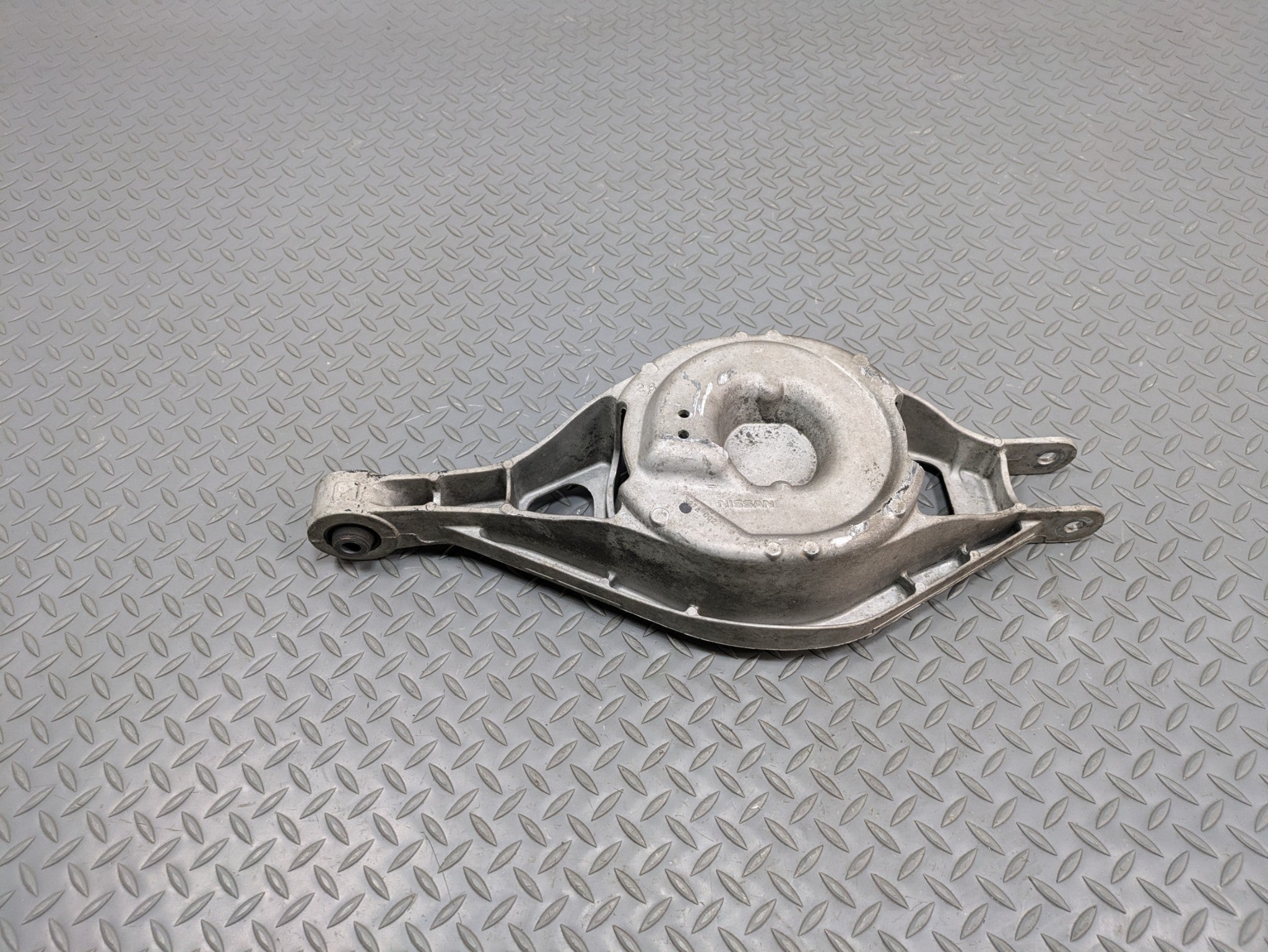 06 - 10 INFINITI M35 OEM LOWER CONTROL ARM MAIN SPRING SUPPORT REAR LEFT SIDE