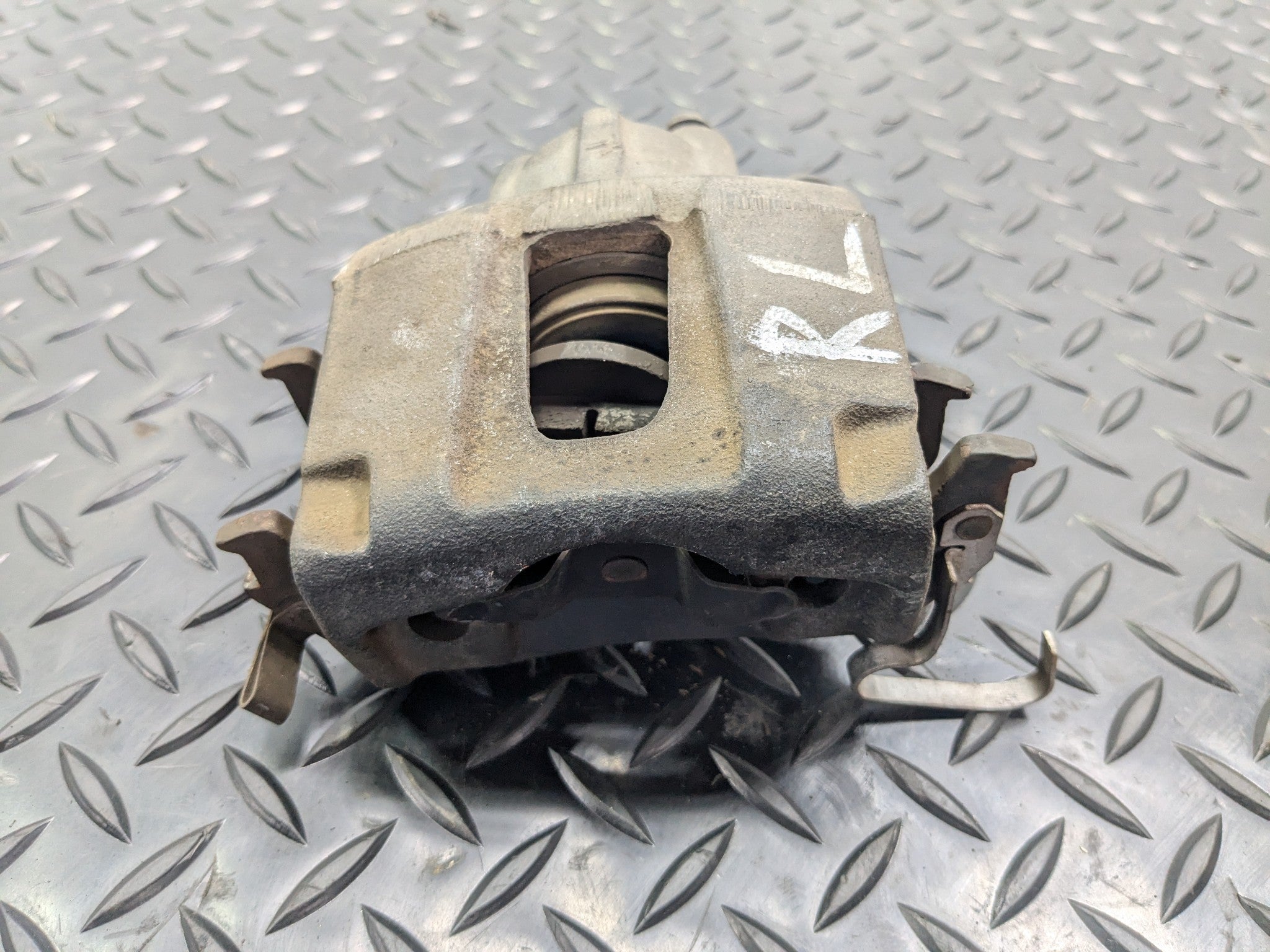 2005 - 2007 OEM NISSAN ARMADA REAR LEFT DRIVER SIDE BRAKE CALIPER