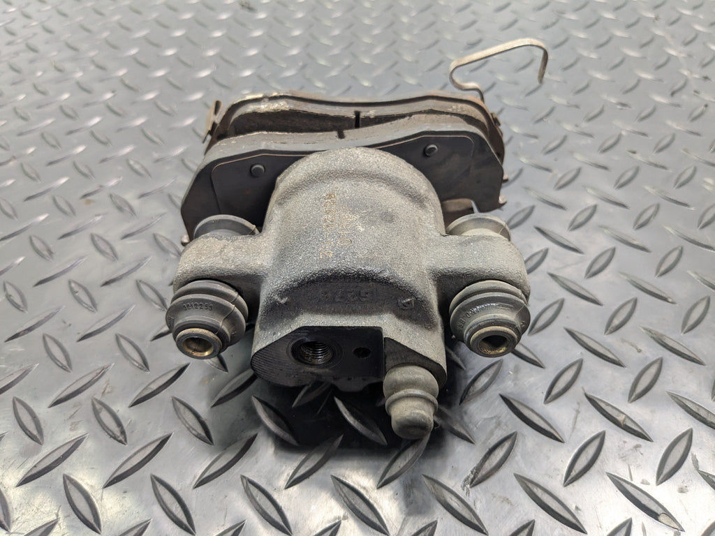 2005 - 2007 OEM NISSAN ARMADA REAR LEFT DRIVER SIDE BRAKE CALIPER