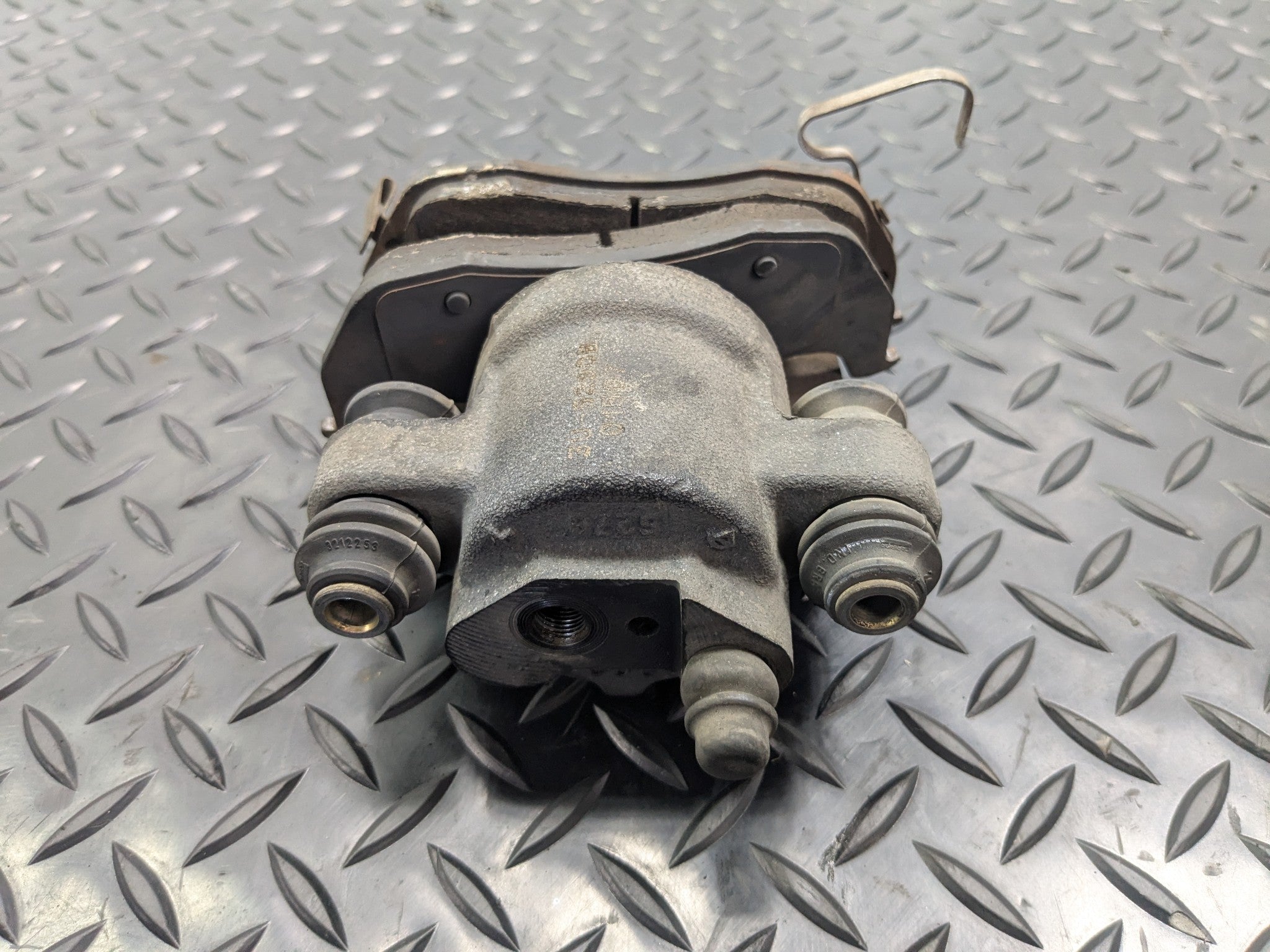 2005 - 2007 OEM NISSAN ARMADA REAR LEFT DRIVER SIDE BRAKE CALIPER