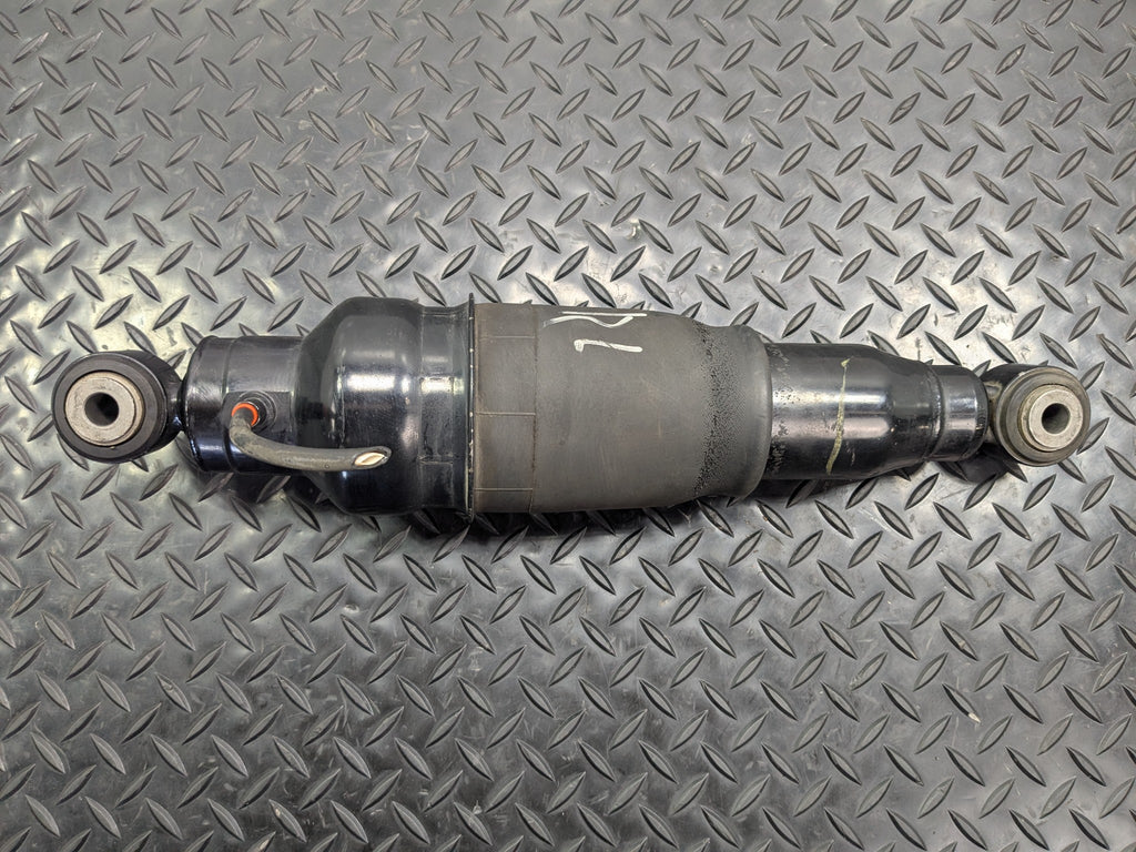 2005 - 2007 OEM NISSAN ARMADA REAR LEFT DRIVER SIDE SHOCK STRUT ASSEEMBLY