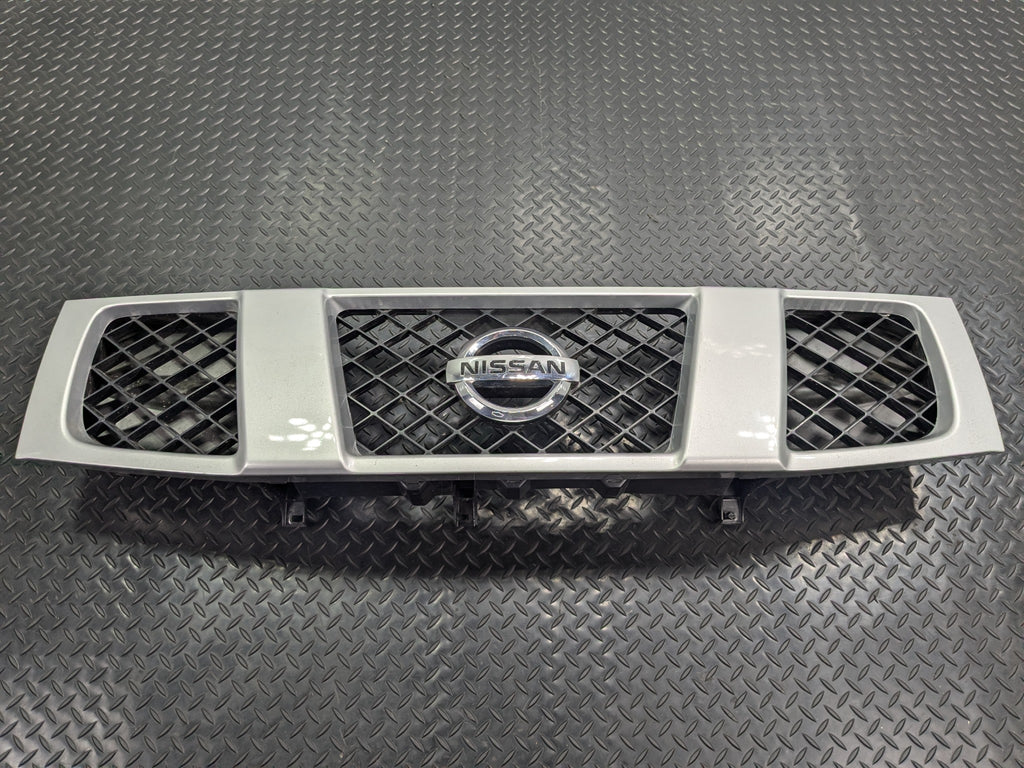 2005 - 2007 OEM NISSAN ARMADA FRONT UPPER BUMPER CENTER GRILLE WITH EMBLEM