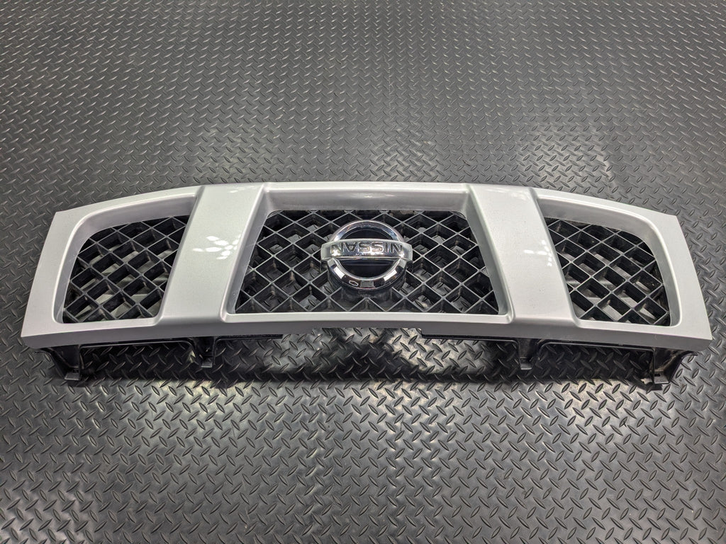 2005 - 2007 OEM NISSAN ARMADA FRONT UPPER BUMPER CENTER GRILLE WITH EMBLEM