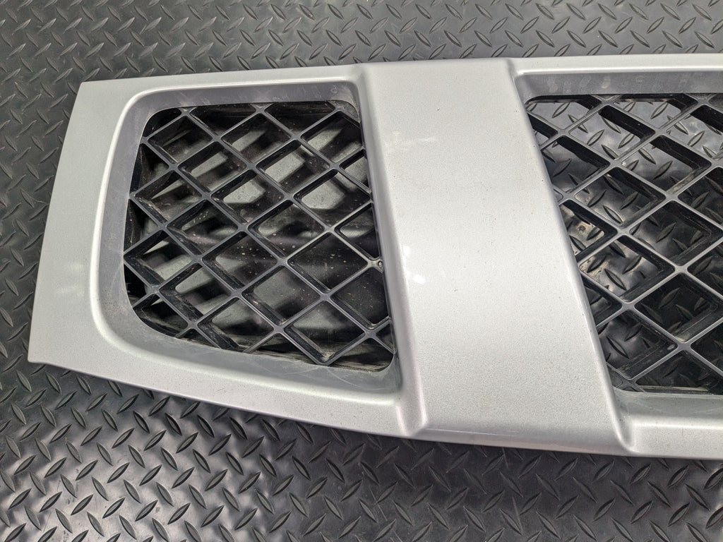 2005 - 2007 OEM NISSAN ARMADA FRONT UPPER BUMPER CENTER GRILLE WITH EMBLEM