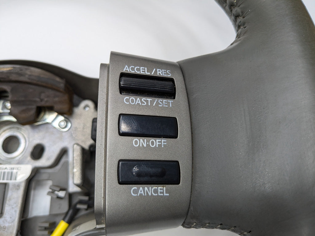 2005 - 2007 OEM NISSAN ARMADA POWER STEERING WHEEL COLUMN