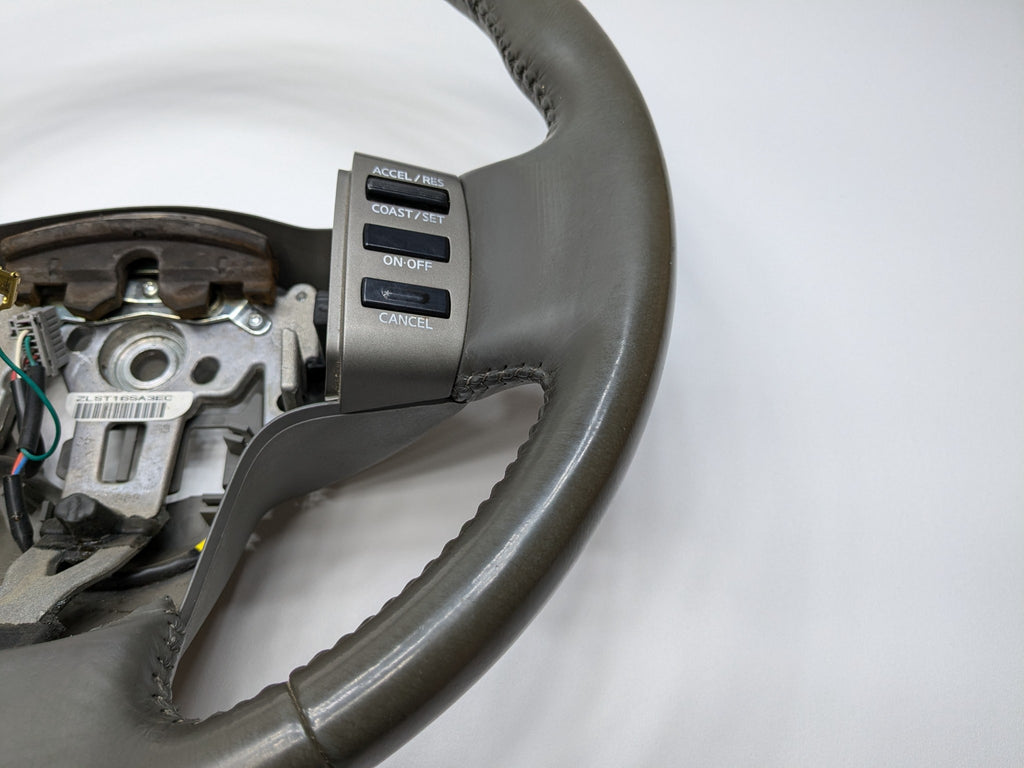 2005 - 2007 OEM NISSAN ARMADA POWER STEERING WHEEL COLUMN