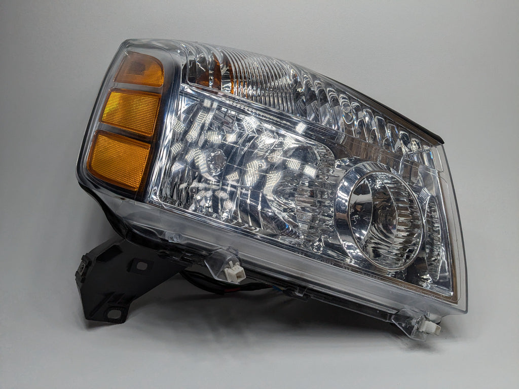 2005 - 2007 OEM NISSAN ARMADA FRONT RIGHT PASSENGER SIDE HEADLAMP ASSEMBLY