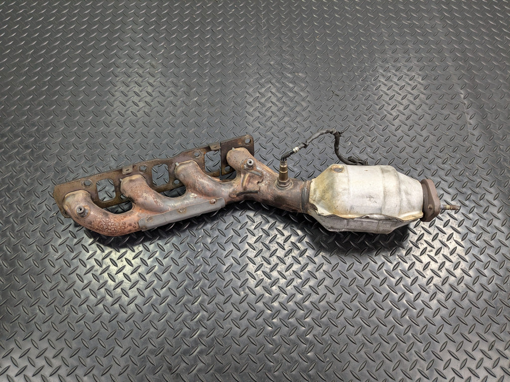 2005 - 2007 OEM NISSAN ARMADA LEFT DRIVER SIDE EXHAUST MANIFOLD