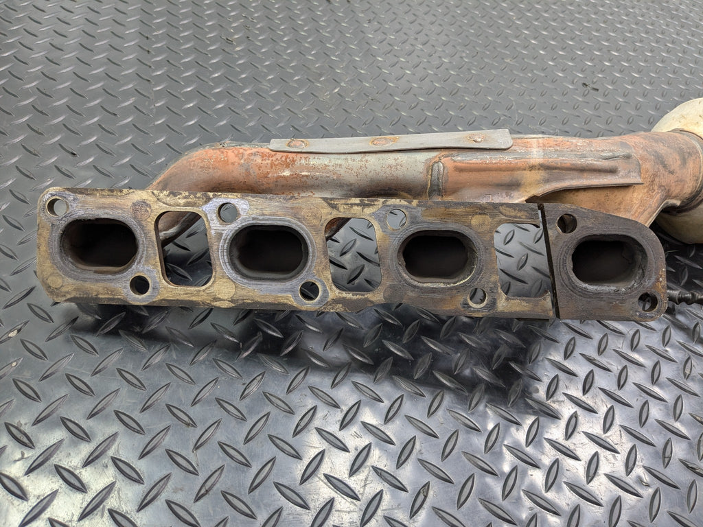 2005 - 2007 OEM NISSAN ARMADA LEFT DRIVER SIDE EXHAUST MANIFOLD