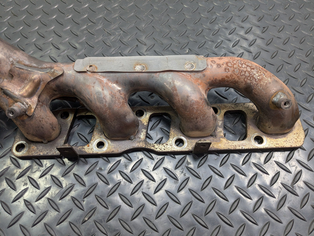 2005 - 2007 OEM NISSAN ARMADA LEFT DRIVER SIDE EXHAUST MANIFOLD
