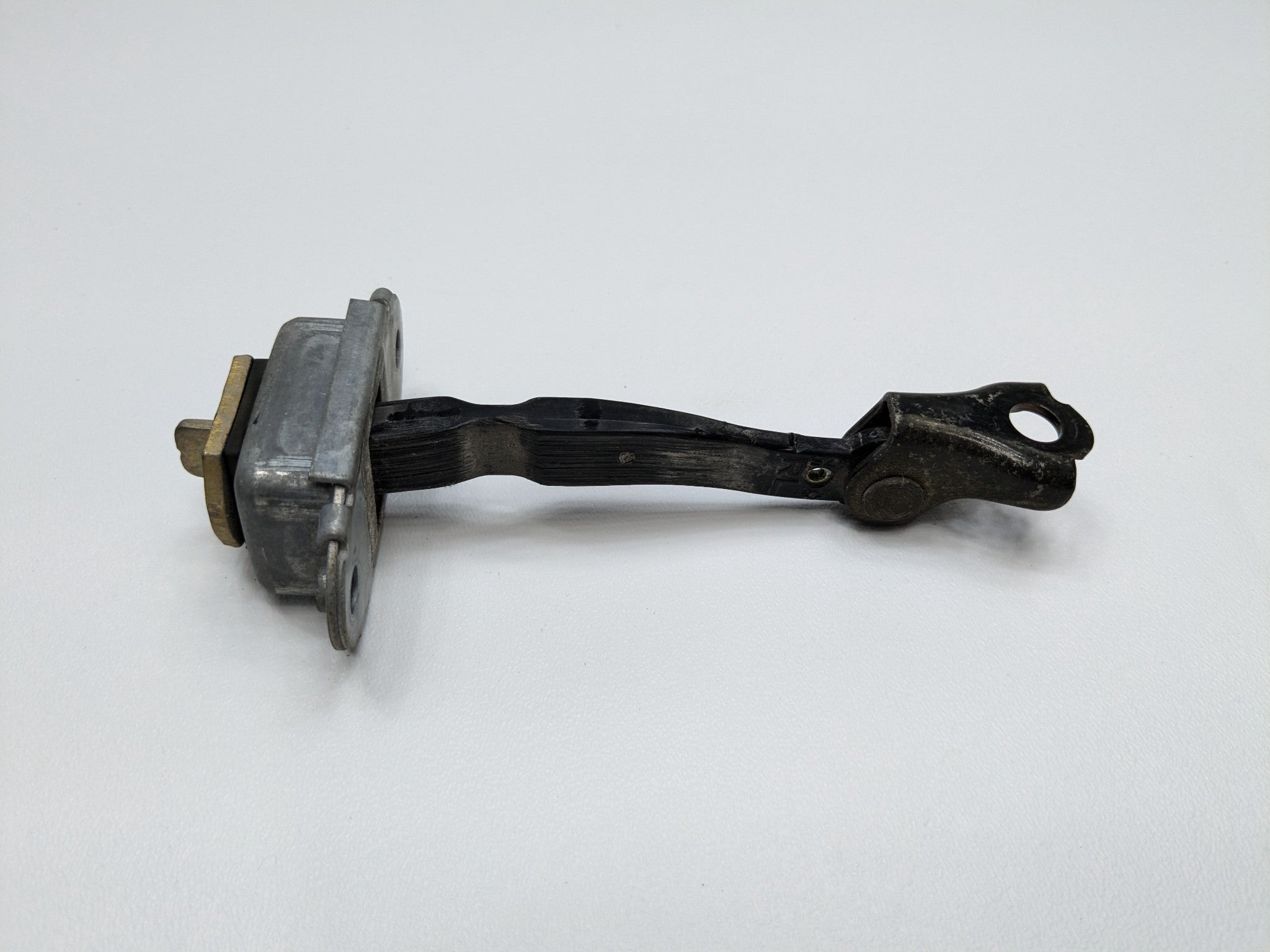 2005 - 2007 OEM NISSAN ARMADA REAR LEFT DRIVER SIDE DOOR CHECK STOPPER