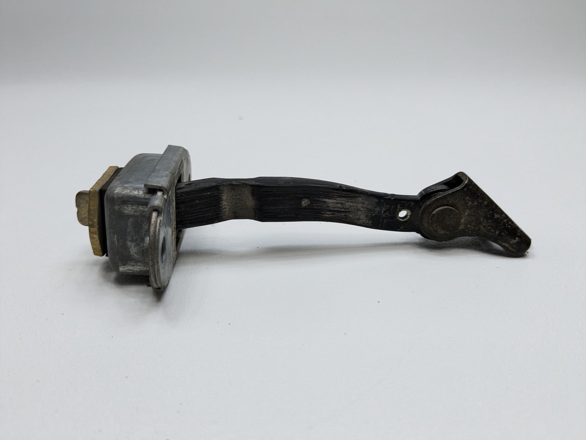 2005 - 2007 OEM NISSAN ARMADA REAR LEFT DRIVER SIDE DOOR CHECK STOPPER