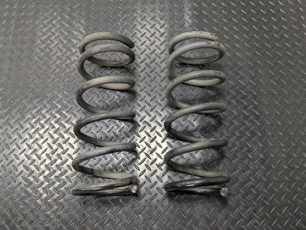 05 - 07 OEM NISSAN ARMADA REAR LEFT AND RIGHT SIDE SUSPENSION COIL SPRING SET