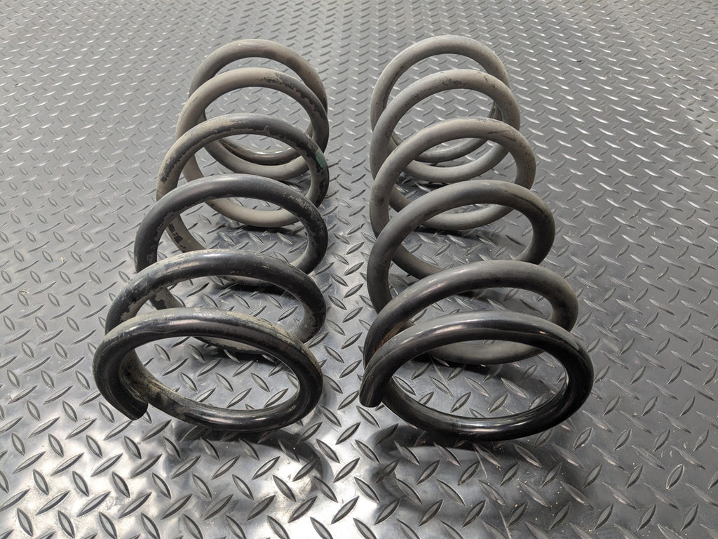 05 - 07 OEM NISSAN ARMADA REAR LEFT AND RIGHT SIDE SUSPENSION COIL SPRING SET