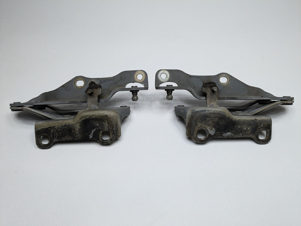 2005 - 2007 OEM NISSAN ARMADA FRONT LEFT AND RIGHT SIDE HOOD HINGE BRACKET SET