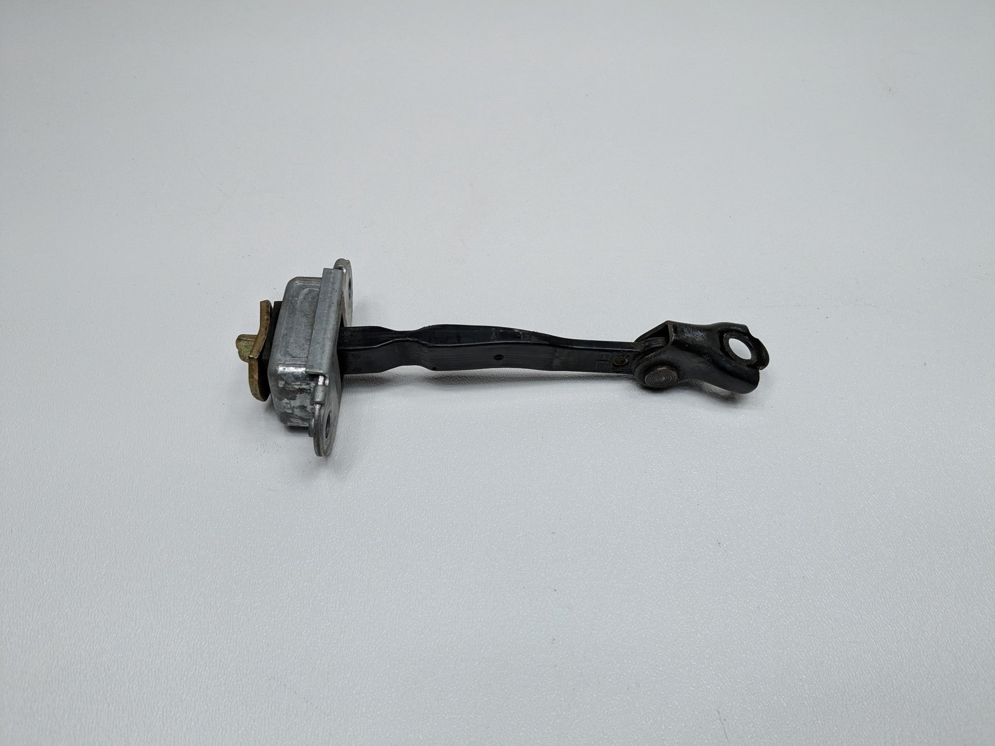 2005 - 2007 OEM NISSAN ARMADA FRONT RIGHT PASSENGER SIDE DOOR CHECK STOPPER