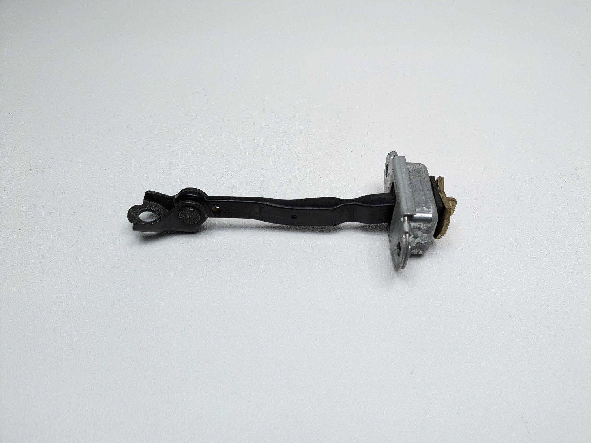 2005 - 2007 OEM NISSAN ARMADA FRONT RIGHT PASSENGER SIDE DOOR CHECK STOPPER