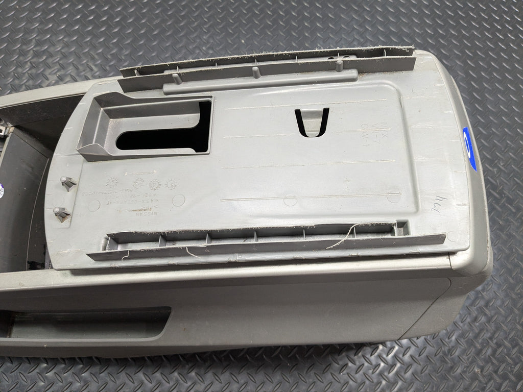 2005 - 2007 OEM NISSAN ARMADA FRONT LOWER CENTER FLOOR CONSOLE ARMREST ASSEMBLY