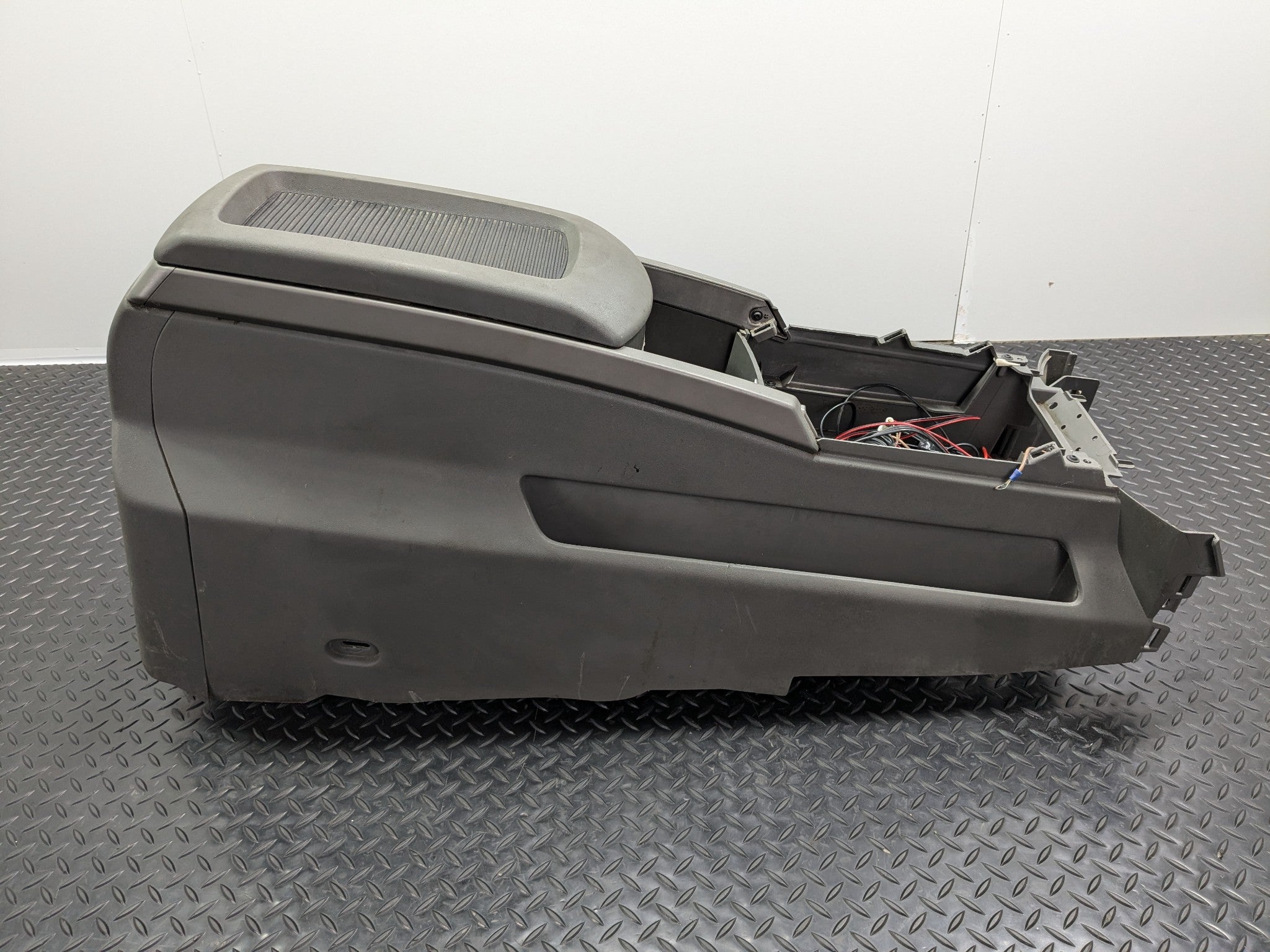 2005 - 2007 OEM NISSAN ARMADA FRONT LOWER CENTER FLOOR CONSOLE ARMREST ASSEMBLY