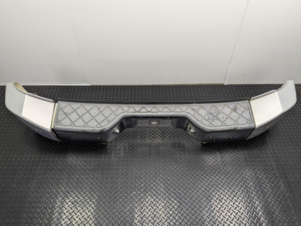 2005 - 2007 OEM NISSAN ARMADA REAR BUMPER ASSEMBLY