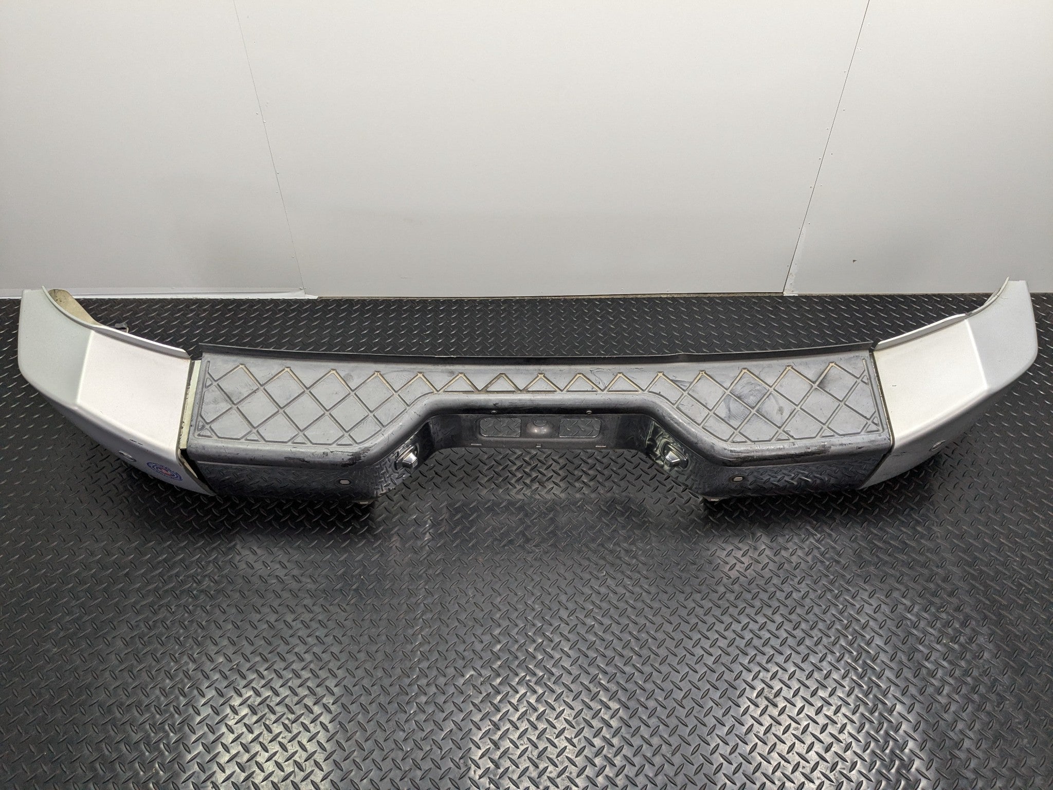 2005 - 2007 OEM NISSAN ARMADA REAR BUMPER ASSEMBLY