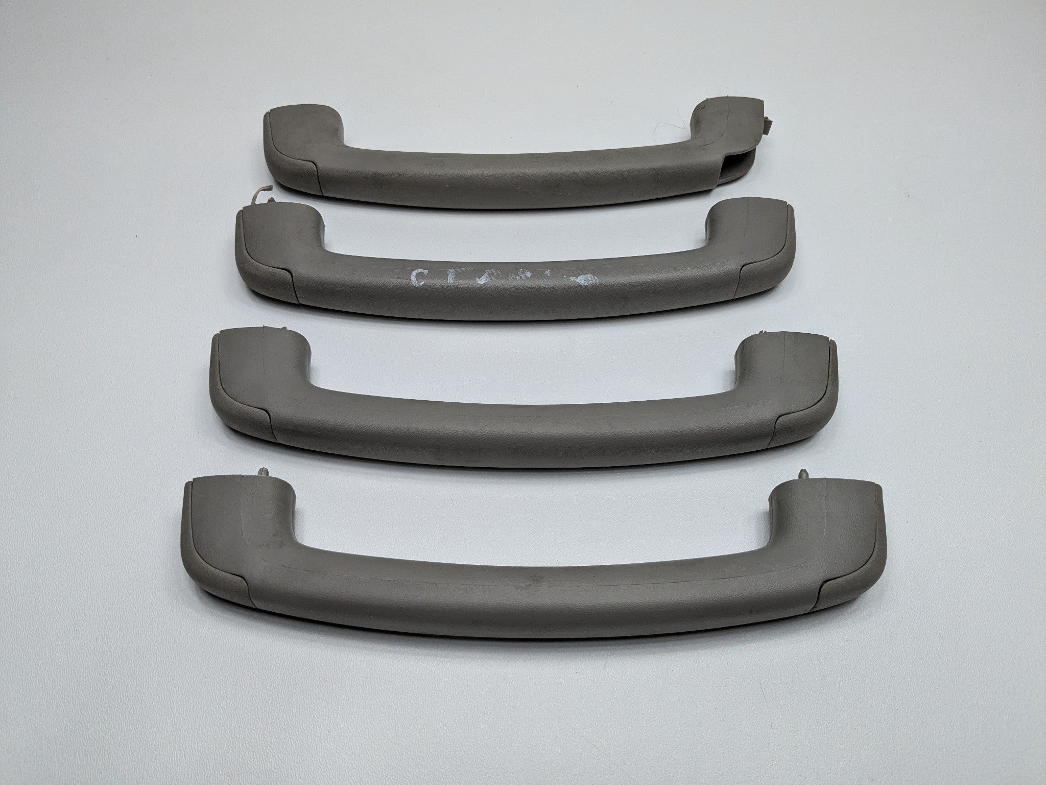 2005 - 2007 OEM NISSAN ARMADA FRONT AND REAR INTERIOR UPPER ROOF GRAB GRIP SET