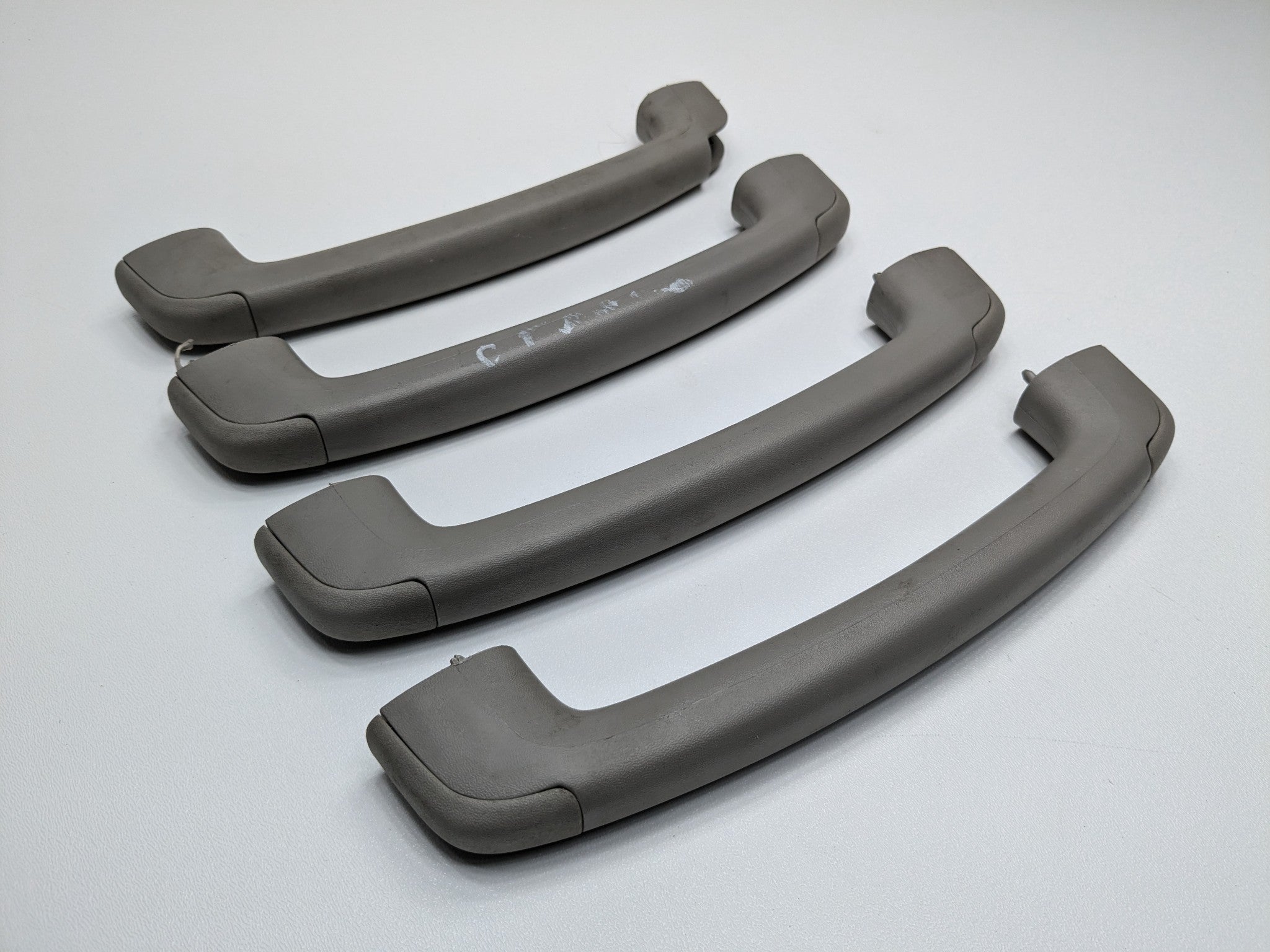 2005 - 2007 OEM NISSAN ARMADA FRONT AND REAR INTERIOR UPPER ROOF GRAB GRIP SET