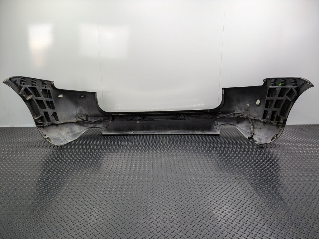 2004 - 2006 OEM PORSCHE CAYENNE V6 REAR BUMPER COVER PANEL ASSEMBLY BLACK