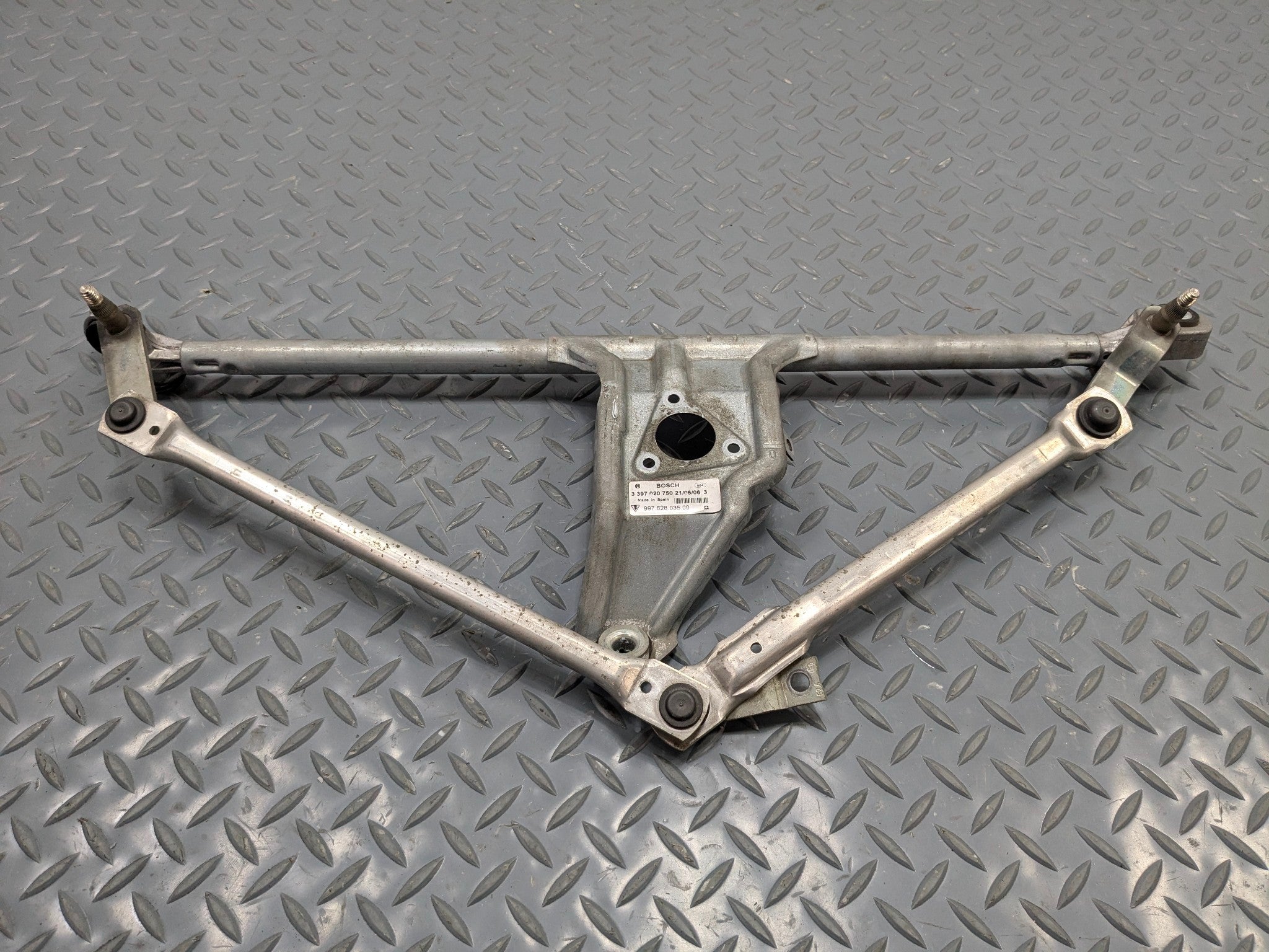 2006 - 2008 OEM PORSCHE CAYMAN FRONT WINDSHIELD WIPER TRANSMISSION LINKAGE