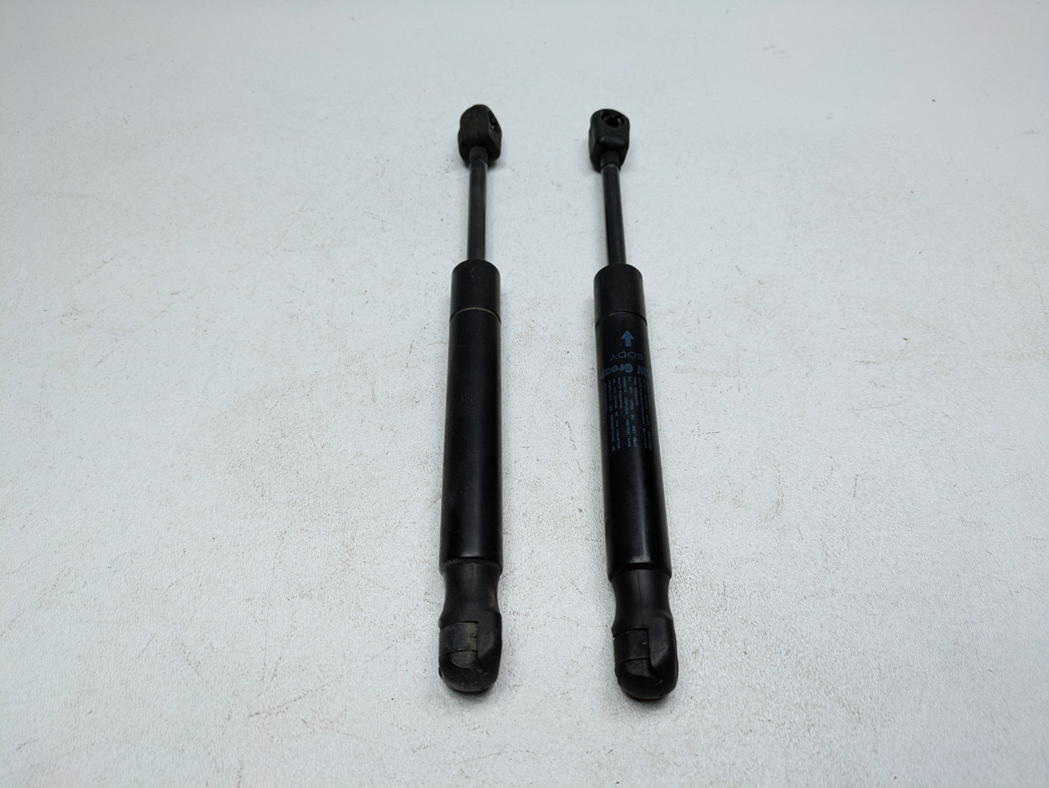 2011 - 2013 OEM MINI COOPER FRONT LEFT AND RIGHT SIDE HOOD SHOCK STRUT ASSEMBLY
