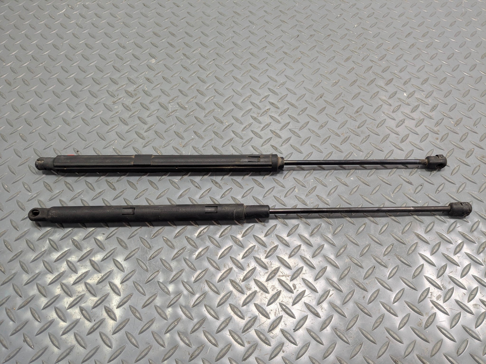 04 - 06 OEM MERCEDES-BENZ C230 FRONT LEFT AND RIGHT SIDE HOOD SHOCK SUPPORT SET