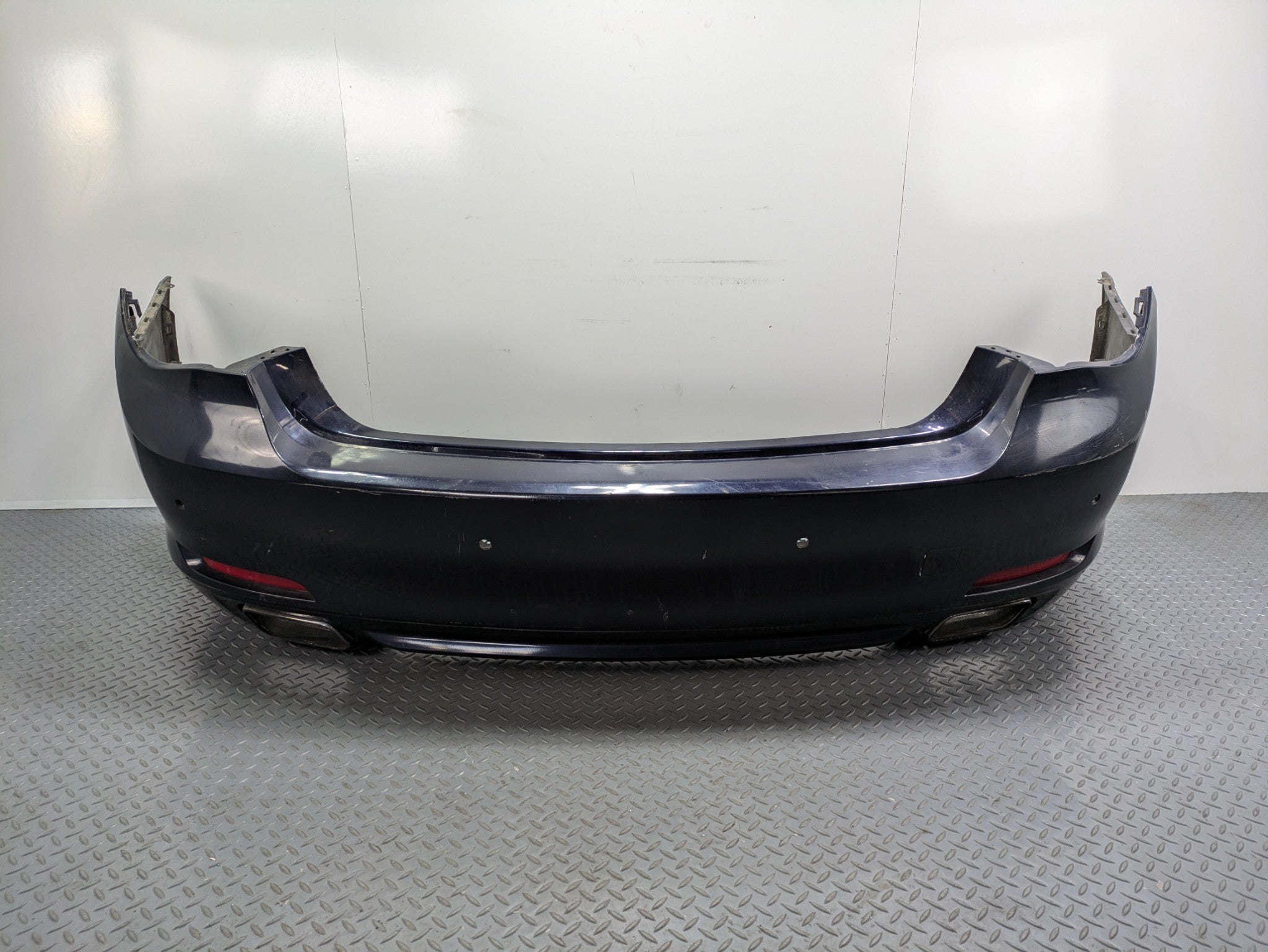 08 - 12 OEM BMW 750LI REAR BUMPER COVER PANEL WITH PARK ASSIST REFLECTOR LIGHT