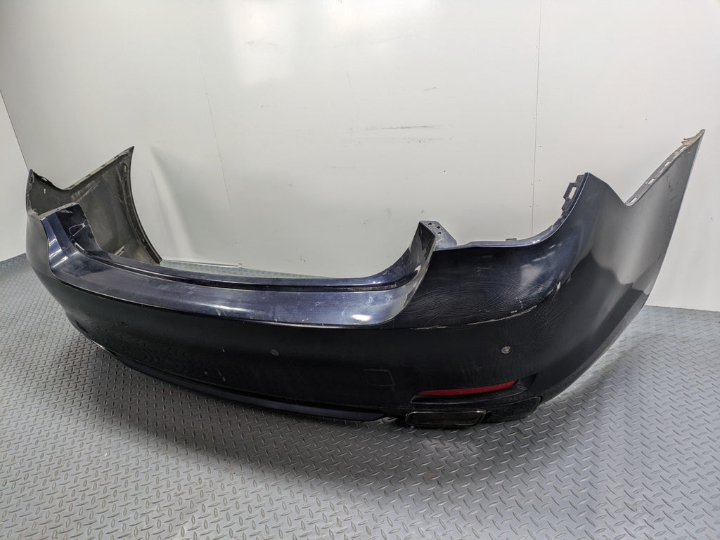 08 - 12 OEM BMW 750LI REAR BUMPER COVER PANEL WITH PARK ASSIST REFLECTOR LIGHT
