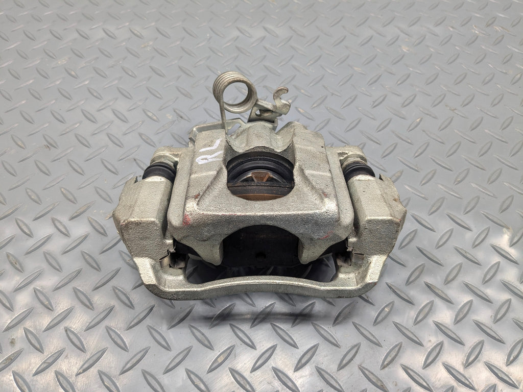 2009 - 2012 OEM FORD FLEX REAR LEFT DRIVE SIDE BRAKE CALIPER ASSEMBLY