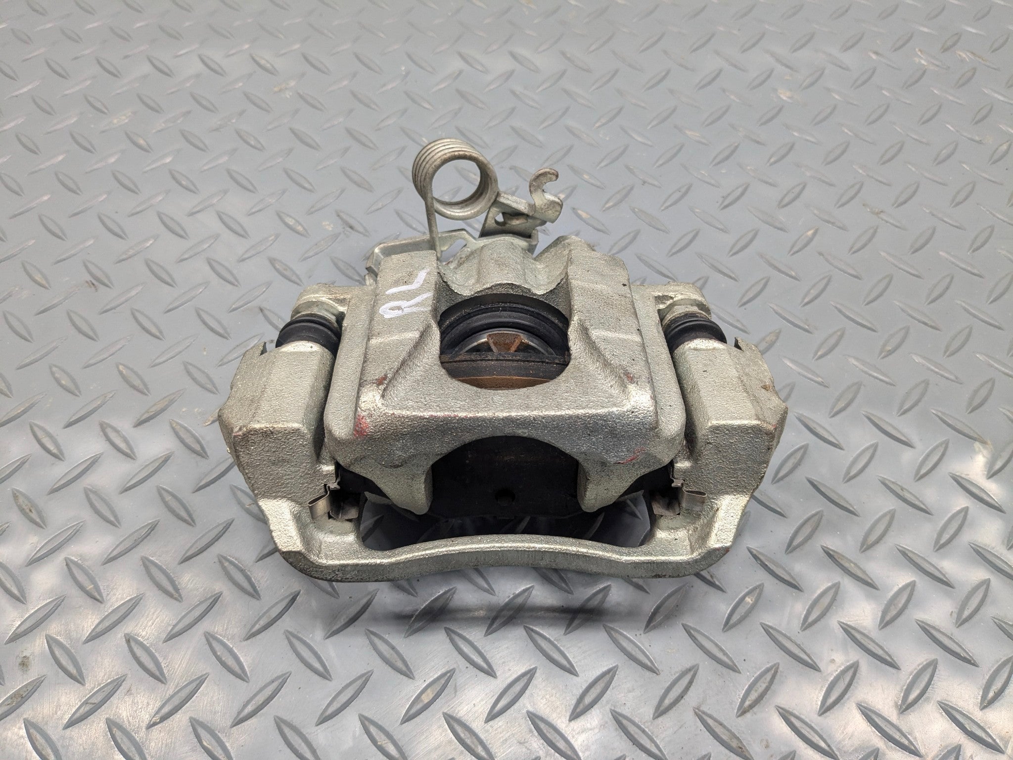 2009 - 2012 OEM FORD FLEX REAR LEFT DRIVE SIDE BRAKE CALIPER ASSEMBLY