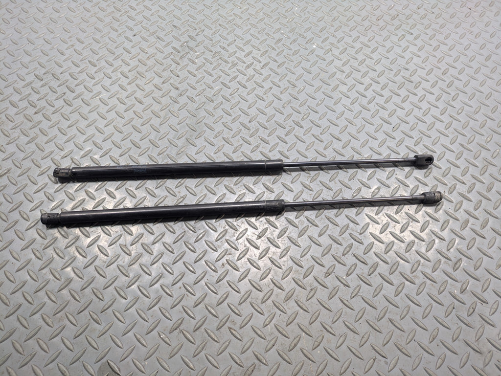 2009 - 2012 OEM FORD FLEX FRONT LEFT AND RIGHT HOOD SUPPORT STRUT SHOCK SET