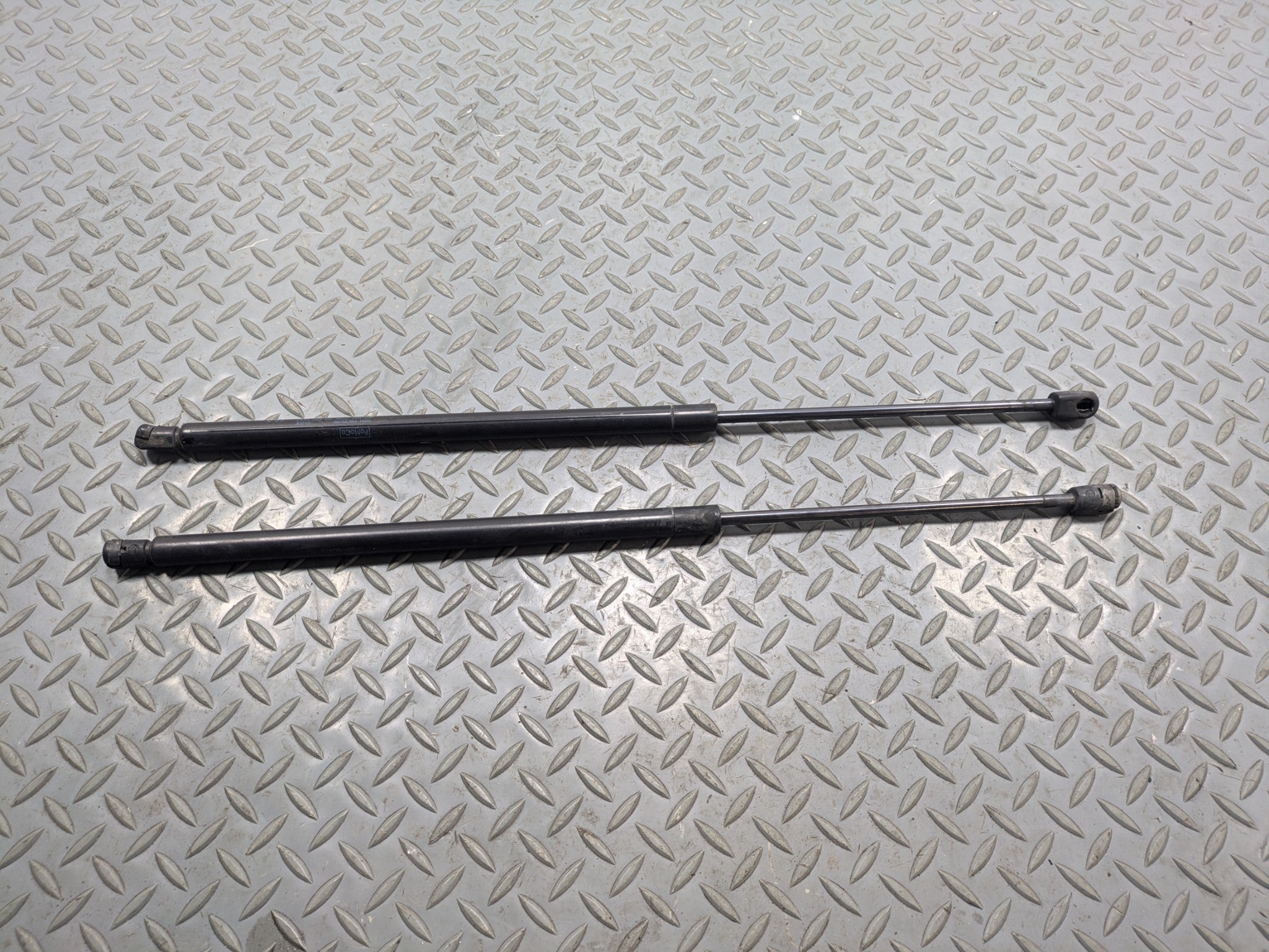 2009 - 2012 OEM FORD FLEX FRONT LEFT AND RIGHT HOOD SUPPORT STRUT SHOCK SET