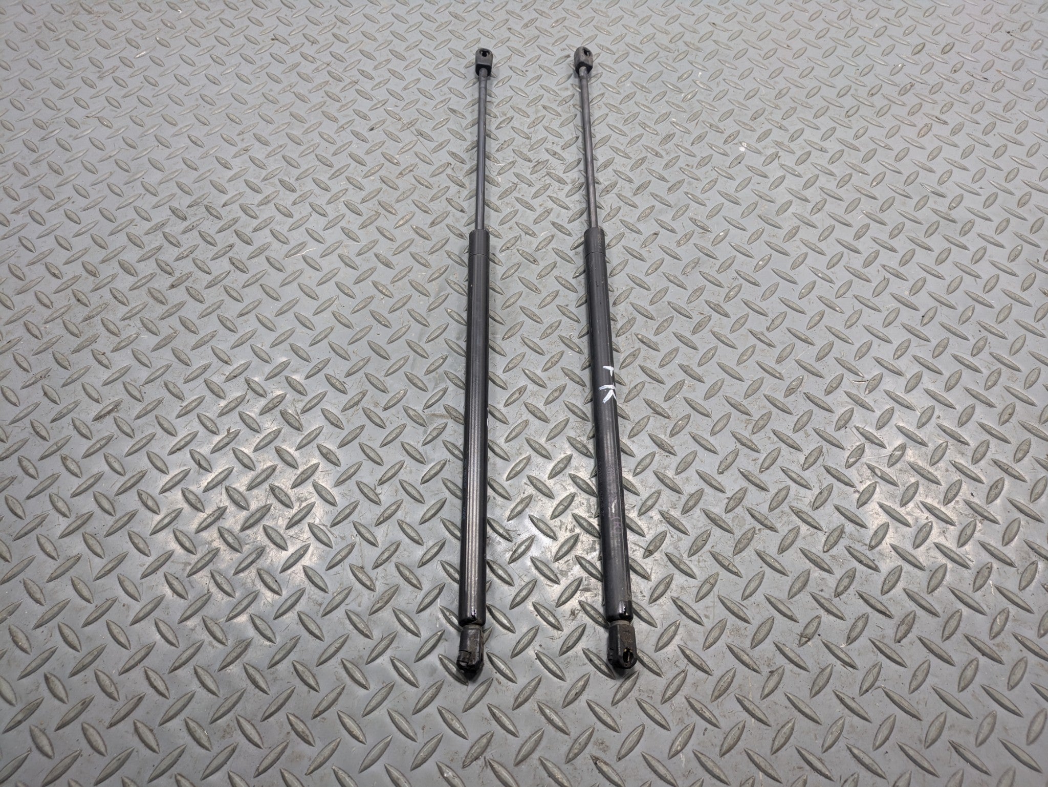 2009 - 2012 OEM FORD FLEX FRONT LEFT AND RIGHT HOOD SUPPORT STRUT SHOCK SET