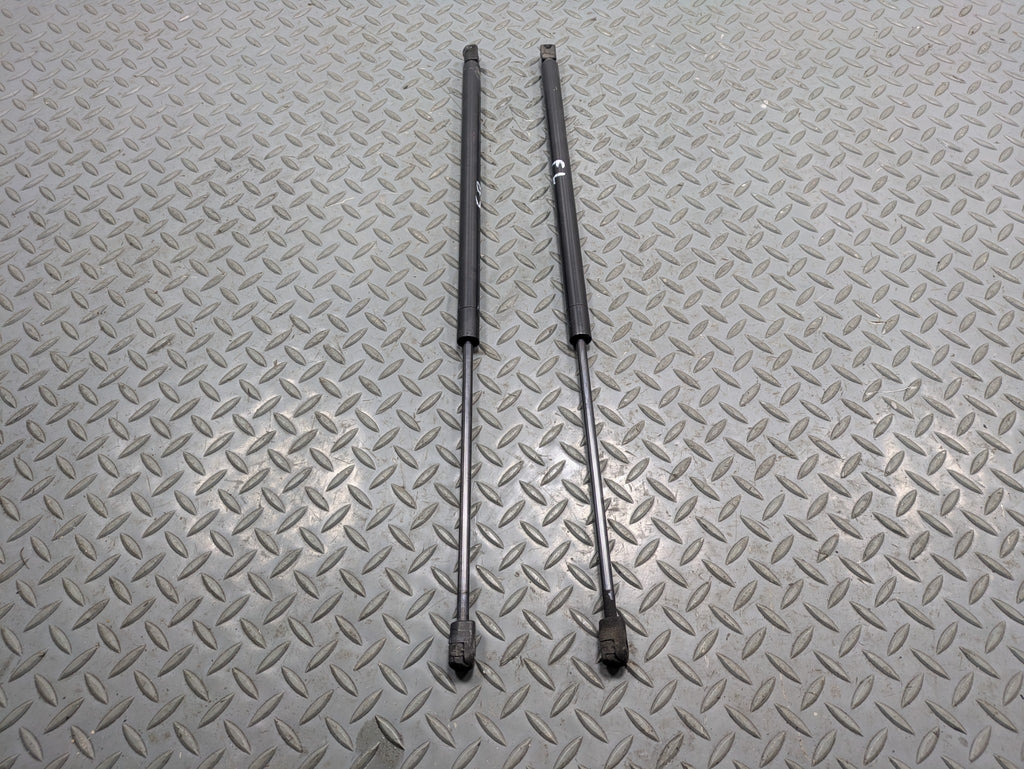 2009 - 2012 OEM FORD FLEX FRONT LEFT AND RIGHT HOOD SUPPORT STRUT SHOCK SET