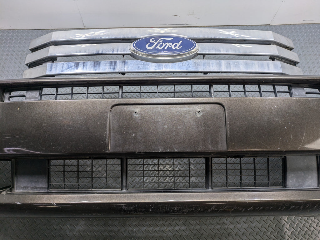 2009 - 2012 OEM FORD FLEX FRONT BUMPER COVER PANEL WITH GRILLE ASSEMBLY